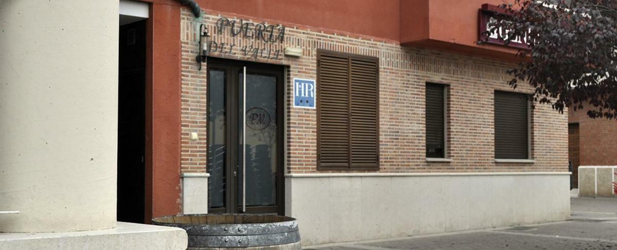 Hostal Puerta Del Valle La Cisterniga Bagian luar foto